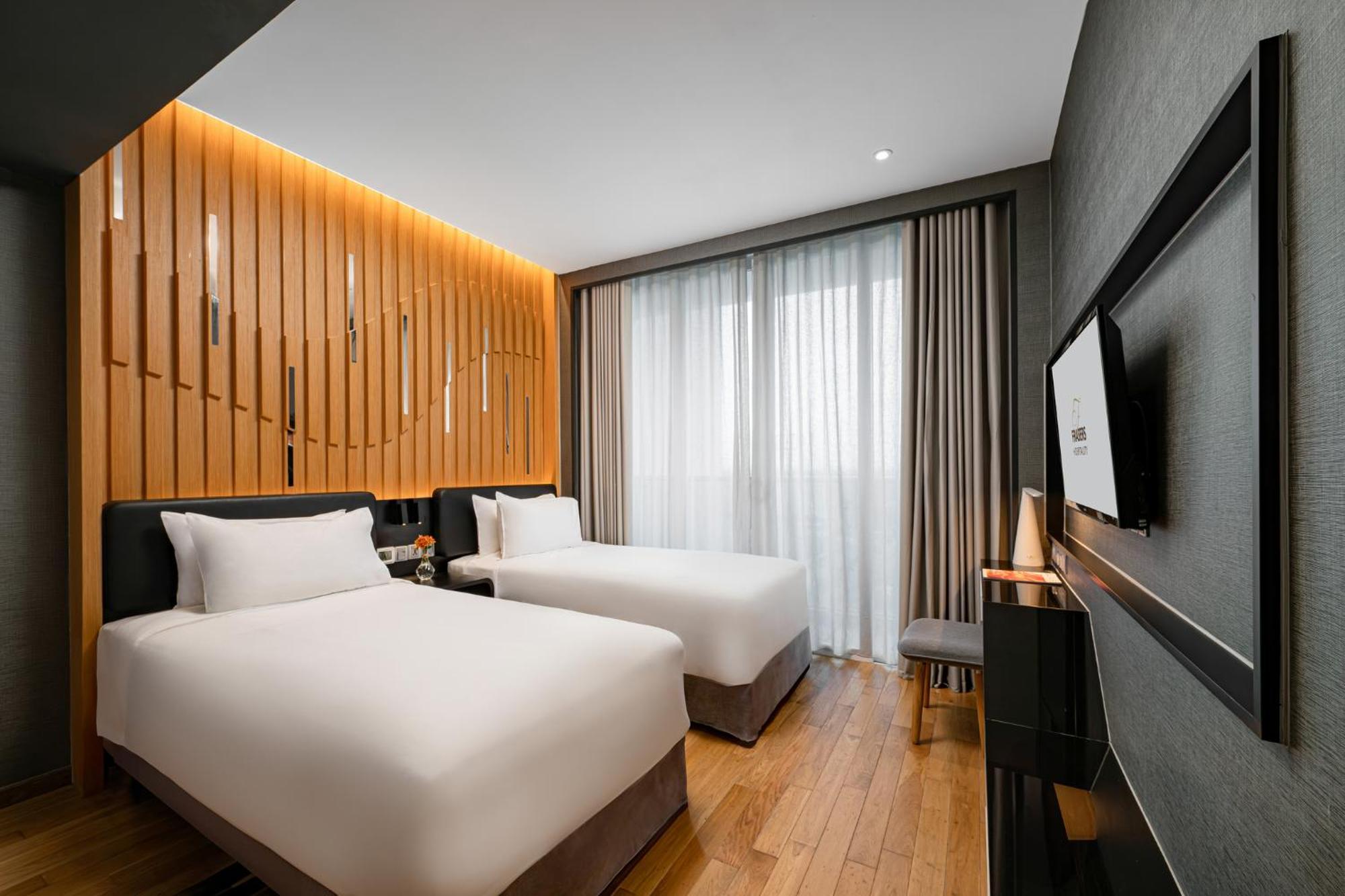 เฟรเซอร์ เพลซ ปูเตรี ฮาร์เบอร์ Hotel นุสาจายา ภายนอก รูปภาพ Deluxe Room